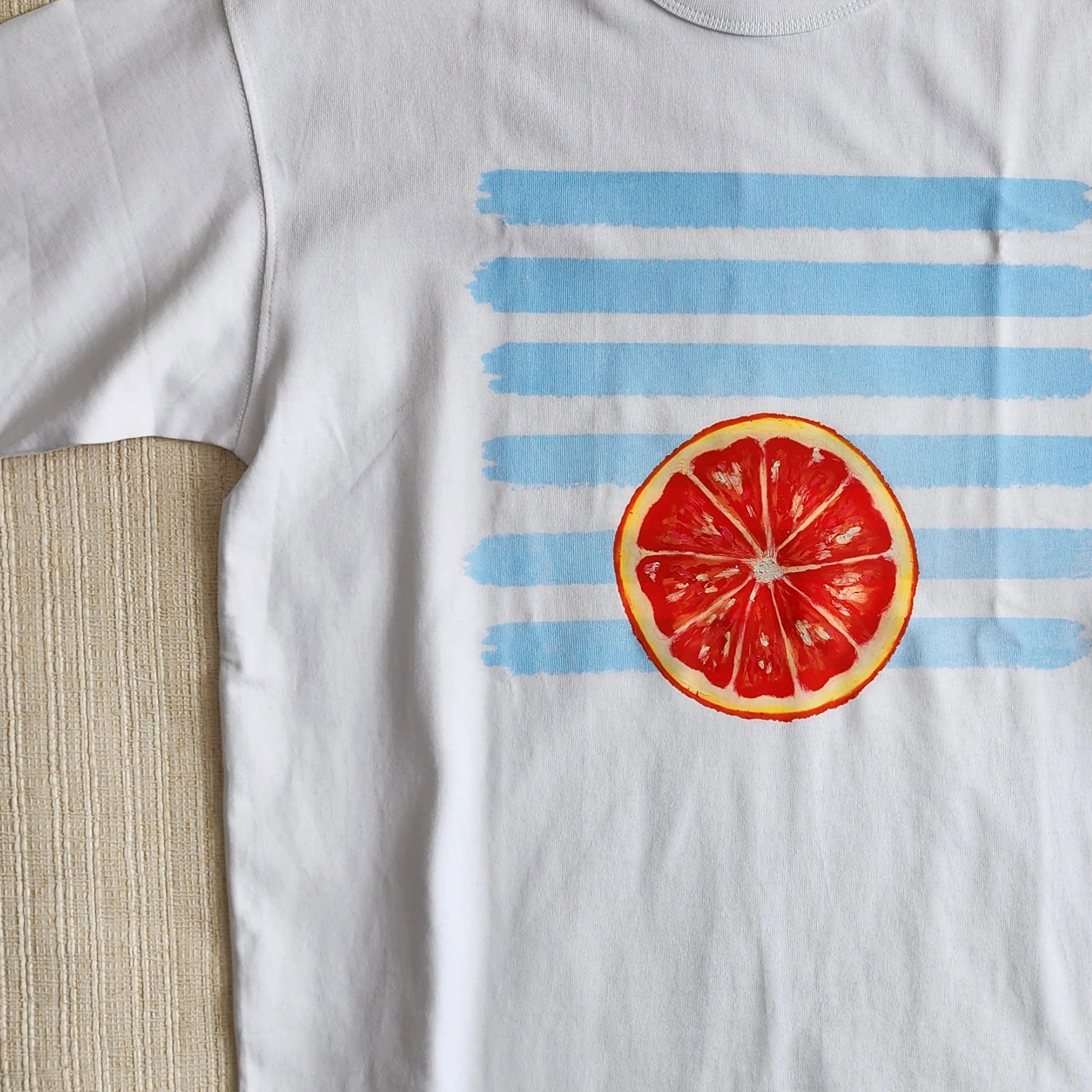 Polera Arancia Rossa Oversize - TINTAmarPolera Arancia Rossa OversizePoleraTINTAmarTINTAmarBlanco