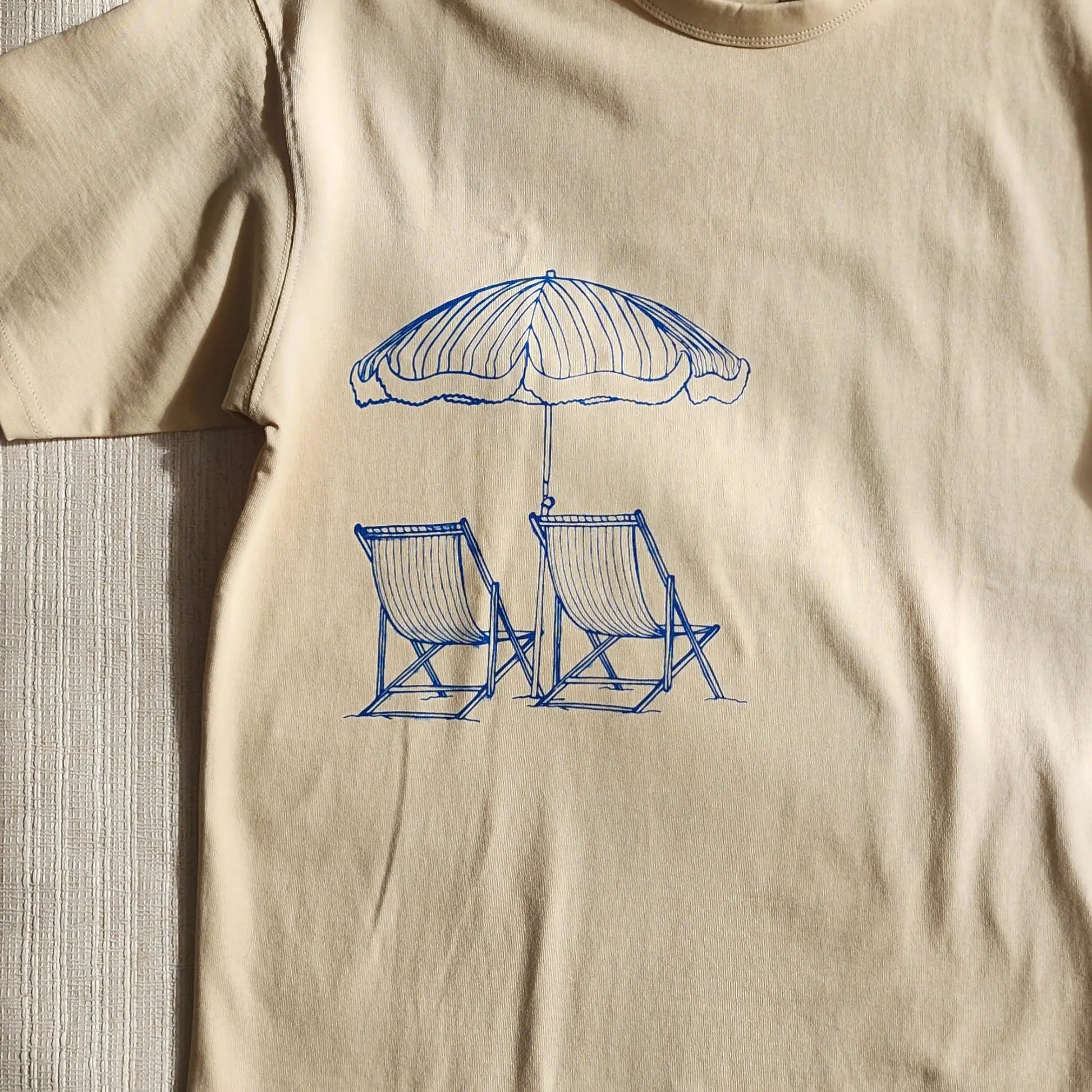 Polera Reposeras Oversize - TINTAmarPolera Reposeras OversizePoleraTINTAmarTINTAmarArenaSPolera Reposeras Oversize