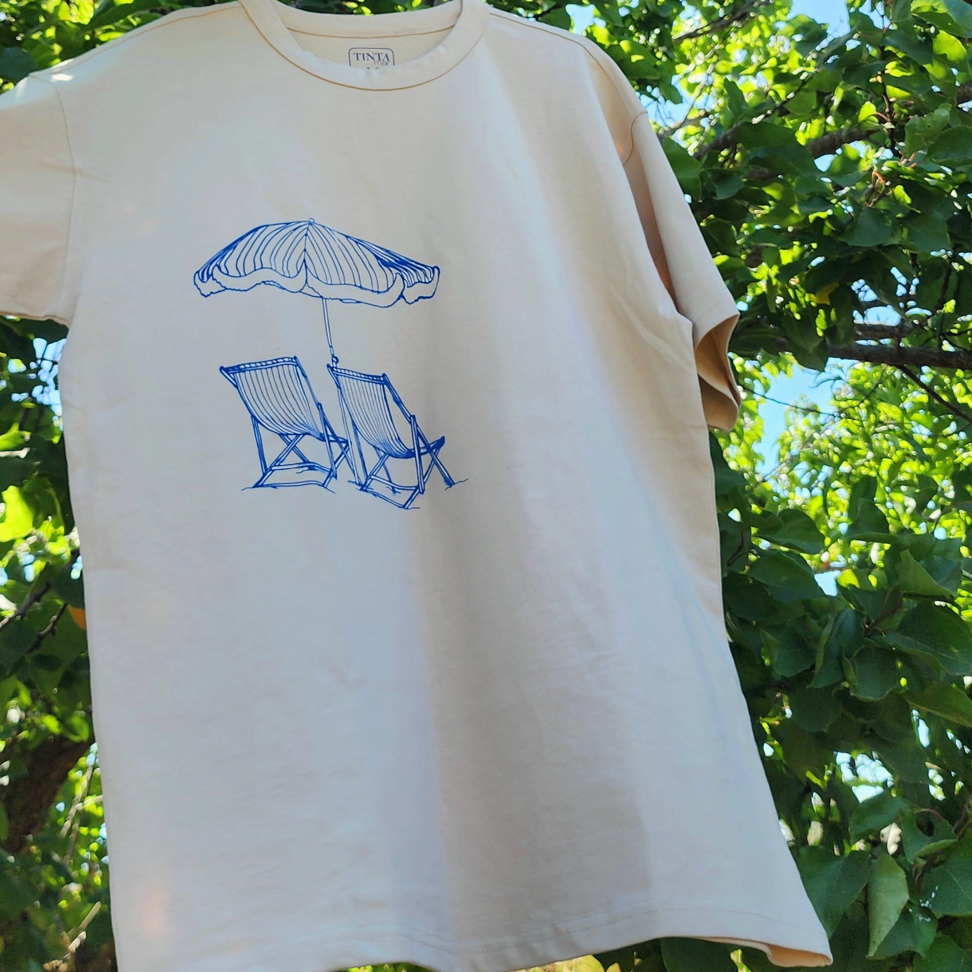 Polera Reposeras Oversize - TINTAmarPolera Reposeras OversizePoleraTINTAmarTINTAmarArenaSPolera Reposeras Oversize