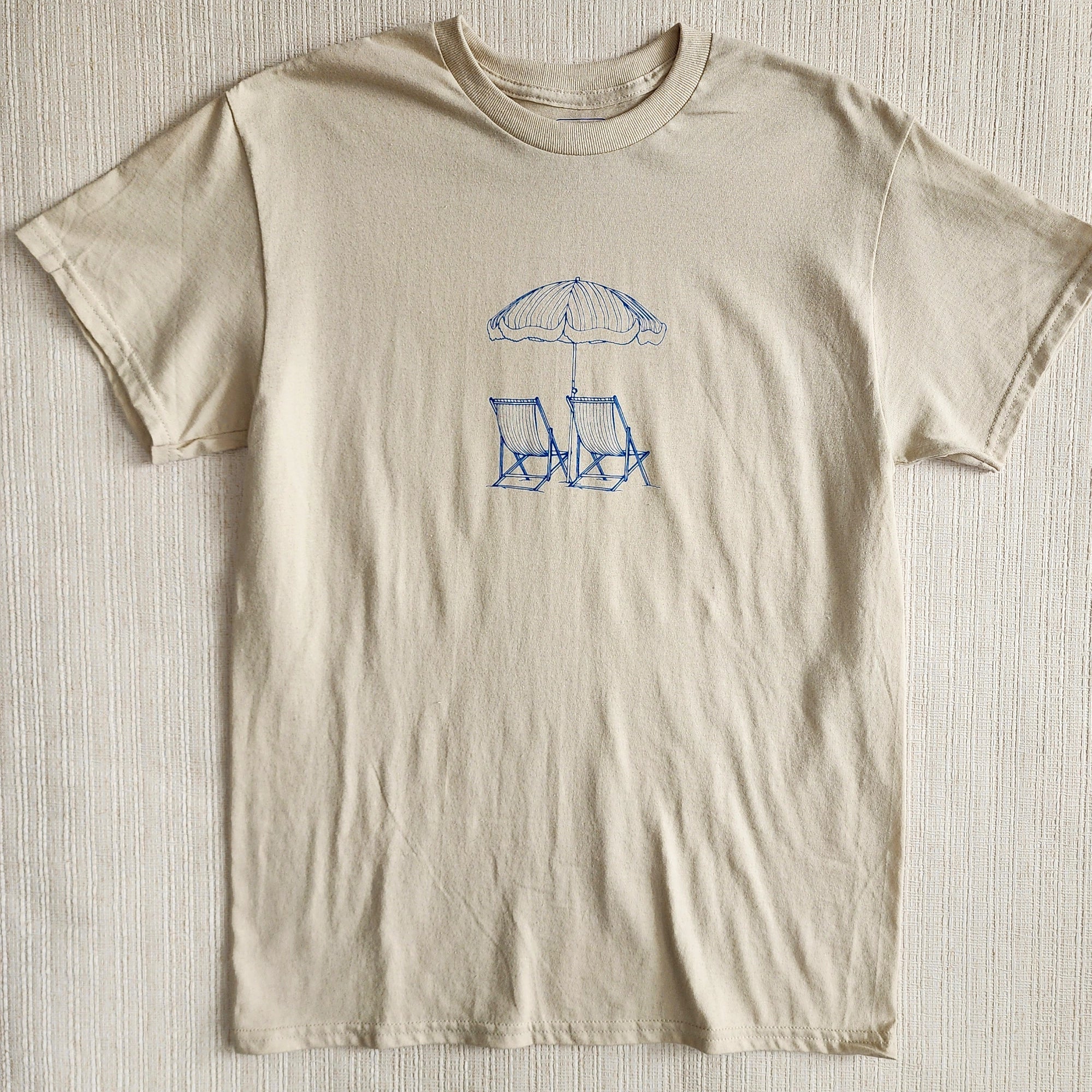 Polera Reposeras Pequeñas Regular Fit - TINTAmarPolera Reposeras Pequeñas Regular FitPoleraTINTAmarTINTAmarArenaSPolera Reposeras Pequeñas Regular Fit